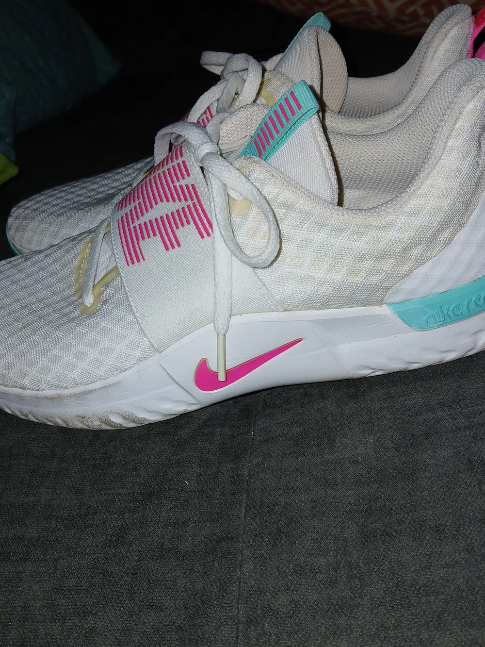 Nike Women’s White Athletic Sneakers with Pink Accents